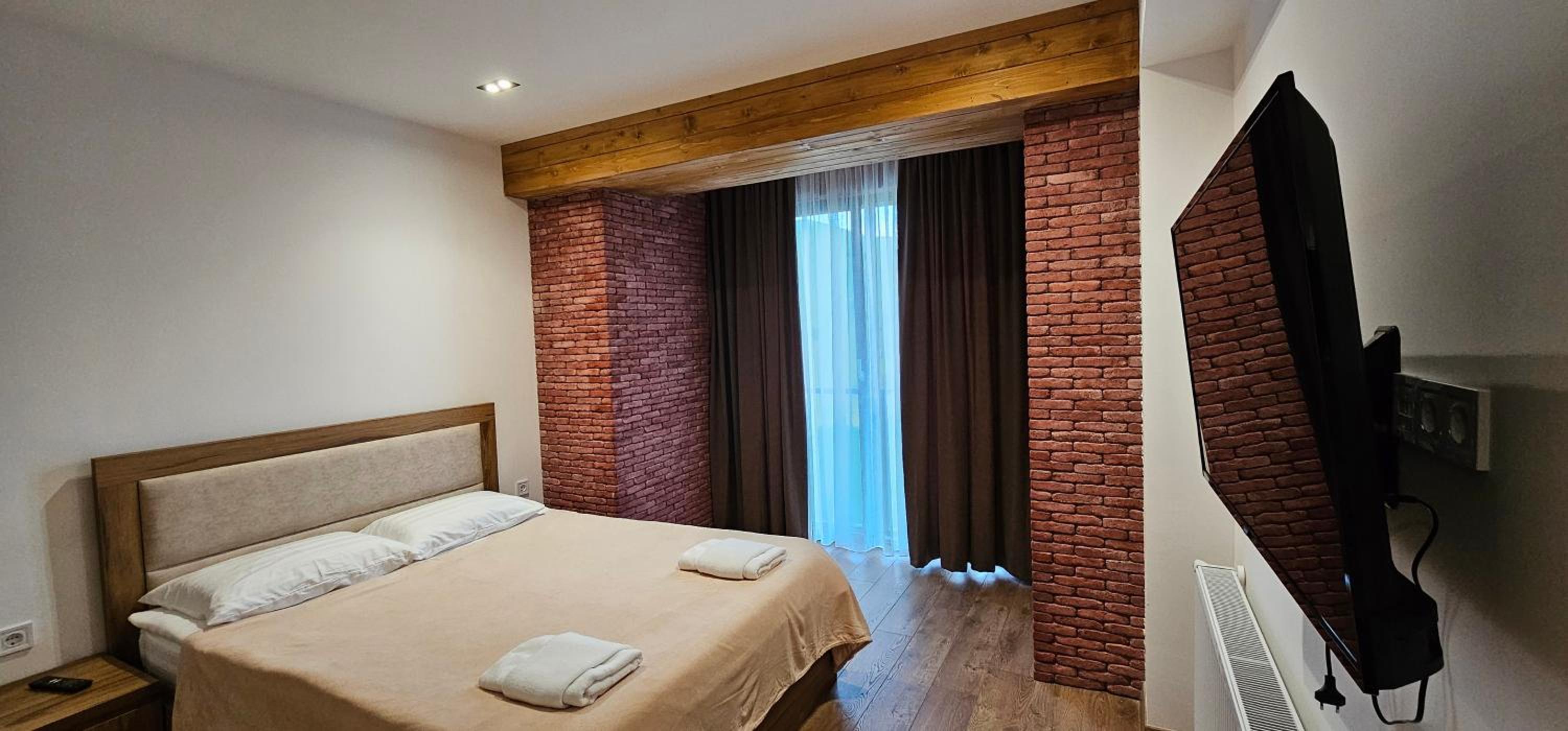 Evdo Apartments F4 wooden cozy studio view 4