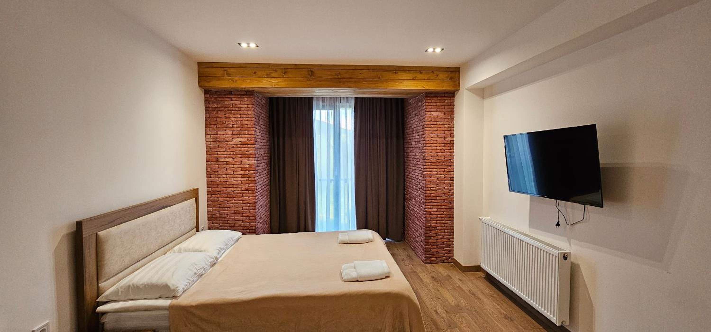 Evdo Apartments F4 wooden cozy studio view 2