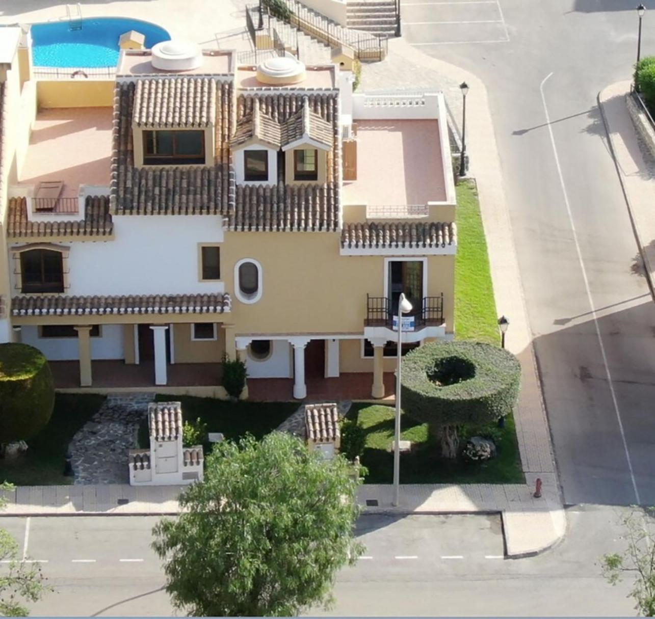 Four Bedroom Townhouse With Communal Pool