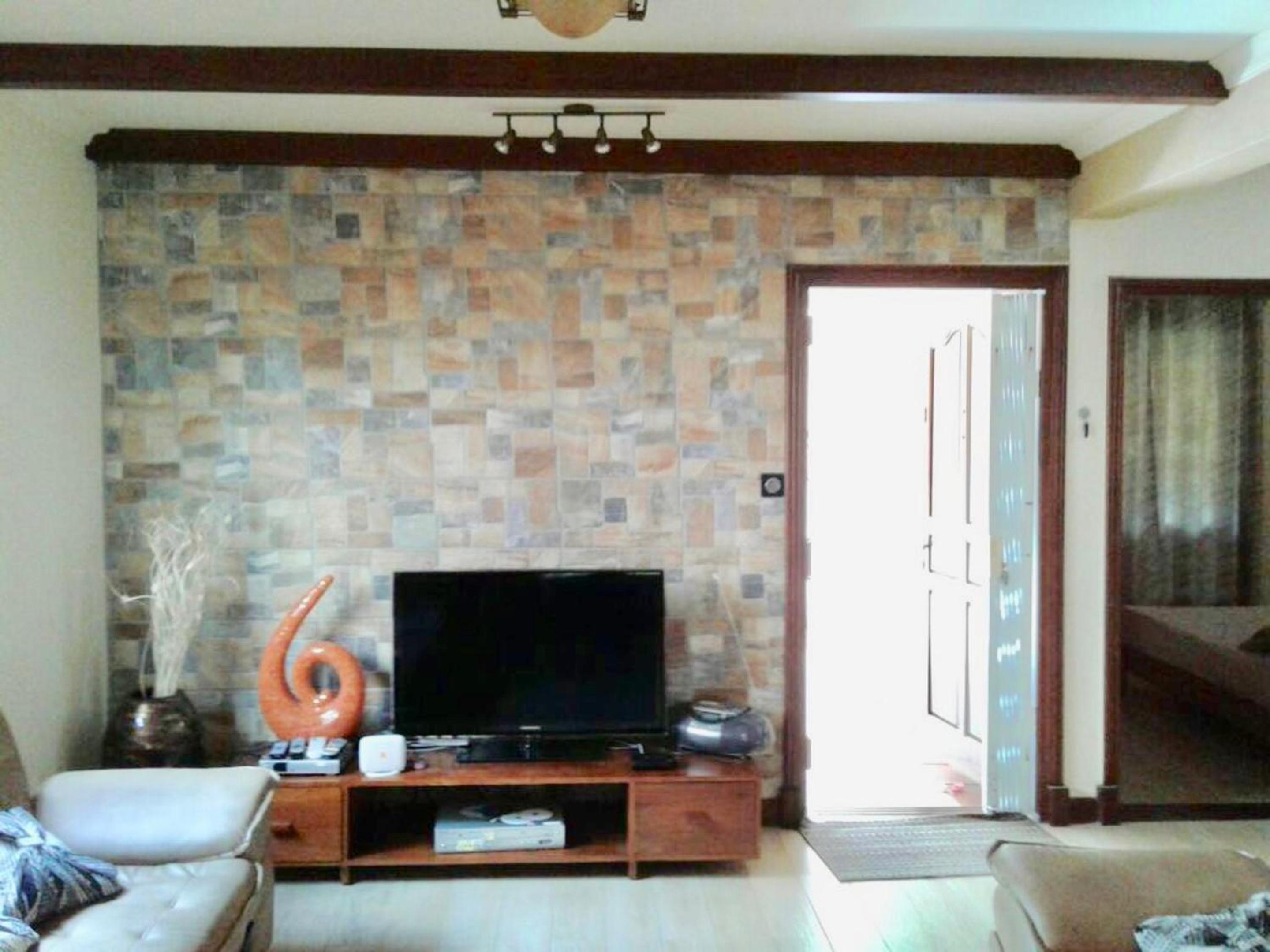 Spacious House in Flic en Flac with Shared Pool view 2