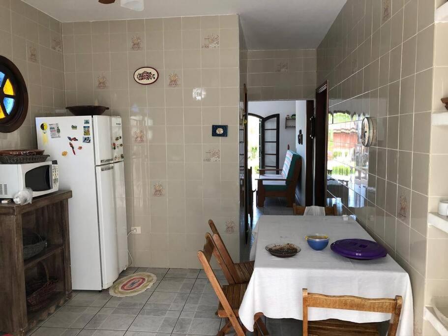 Linda casa com piscina à 3min da Praia caminhando