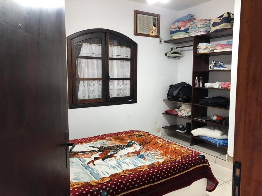 Linda casa com piscina à 3min da Praia caminhando