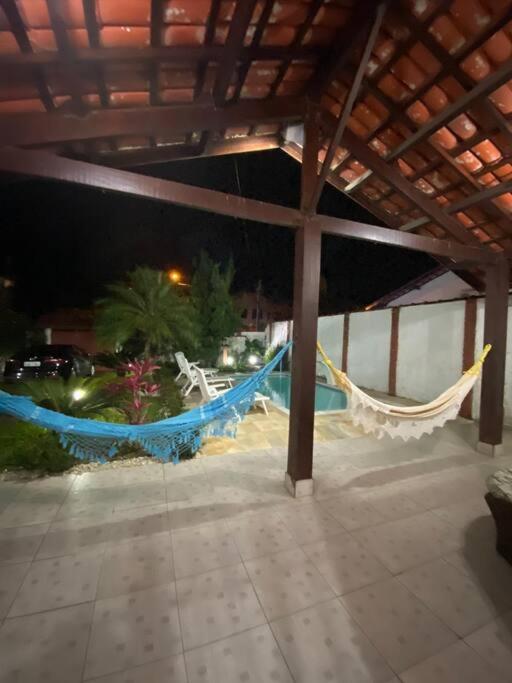 Linda casa com piscina à 3min da Praia caminhando
