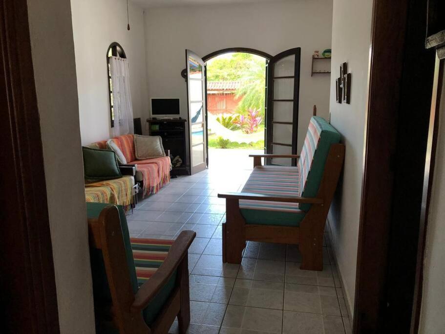 Linda casa com piscina à 3min da Praia caminhando