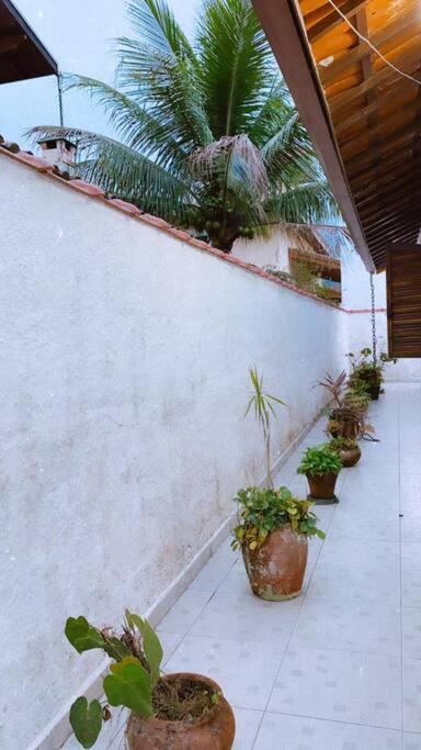 Linda casa com piscina à 3min da Praia caminhando