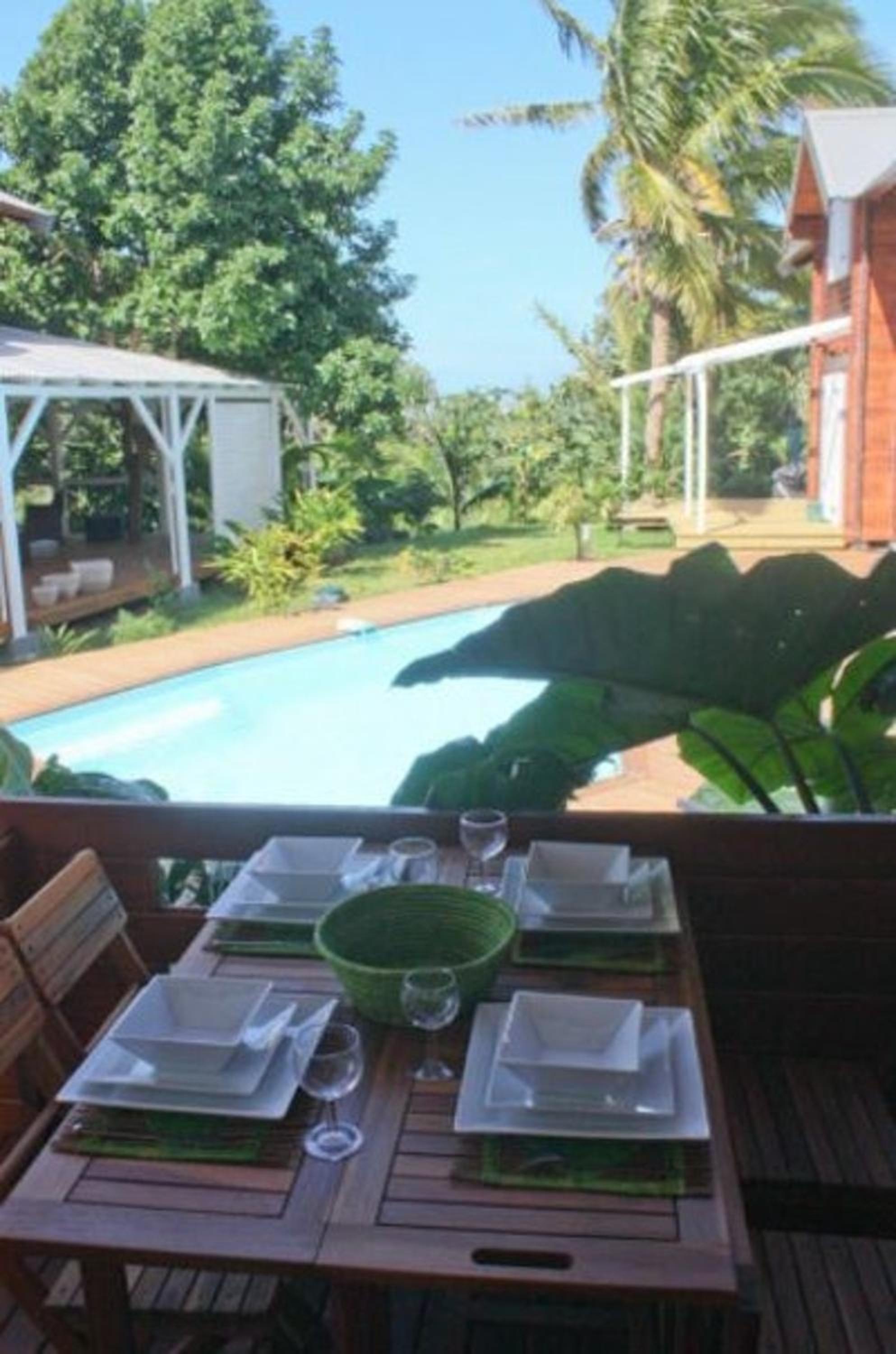 Bungalow charmant à Vincendo avec piscine partagée