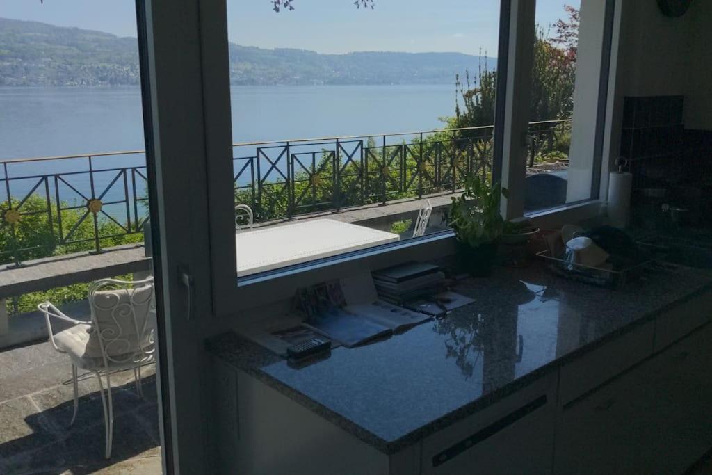 Lovely 60ies Villa on the lake, pool and Sauna