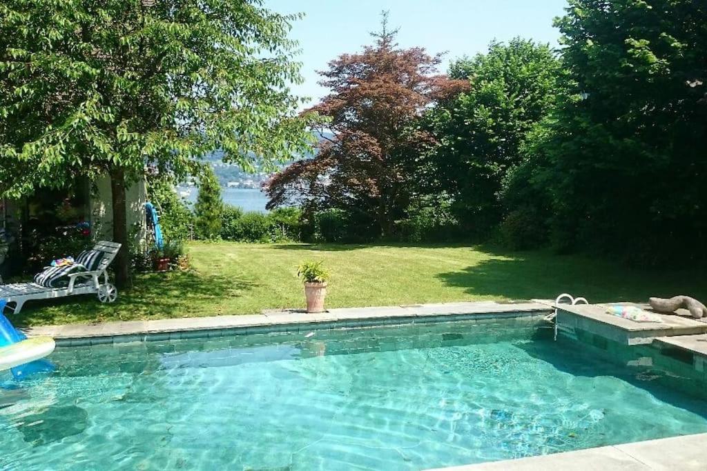 Lovely 60ies Villa on the lake, pool and Sauna