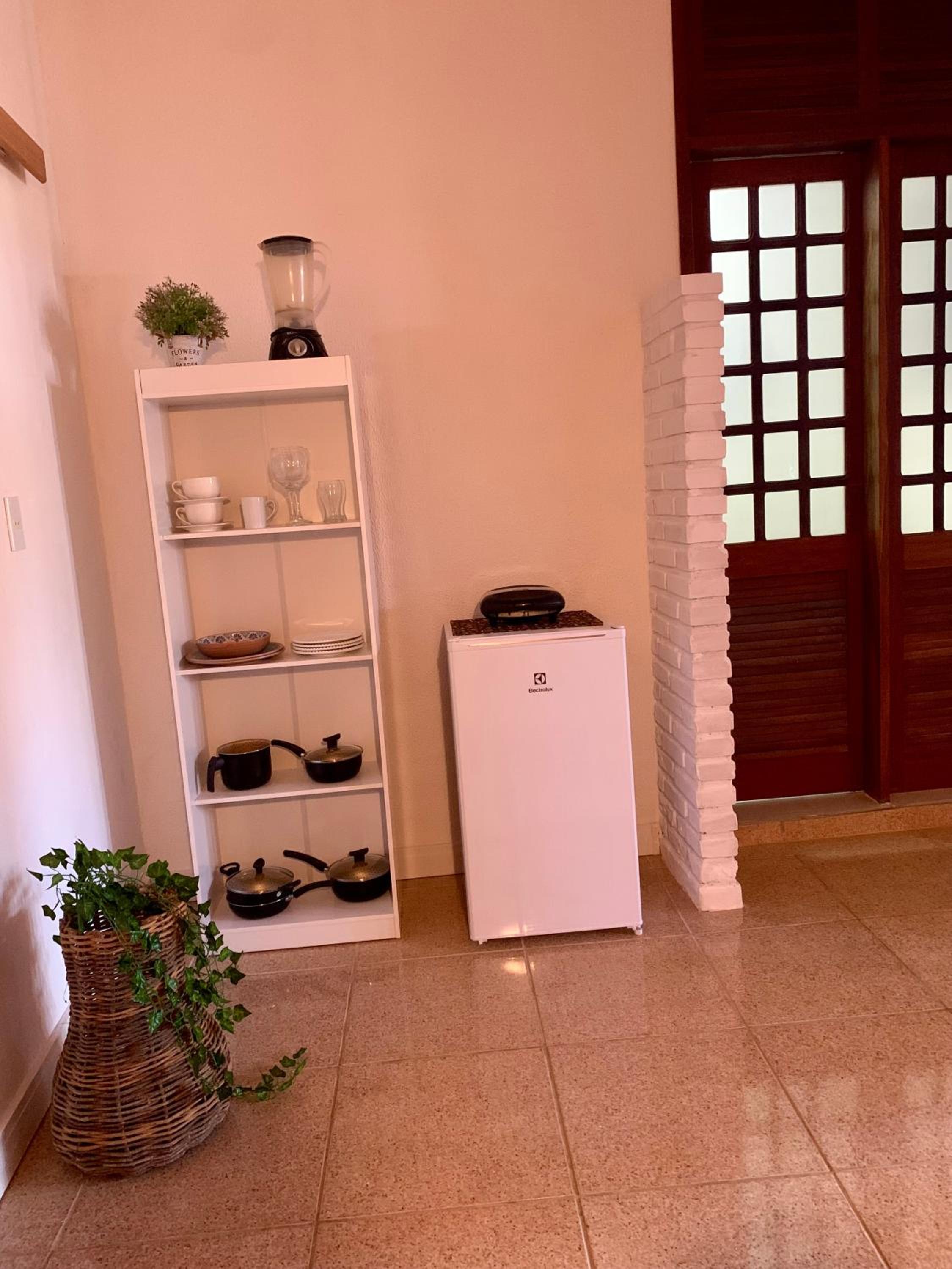 Suíte frente mar com cozinha e quintal pés na areia