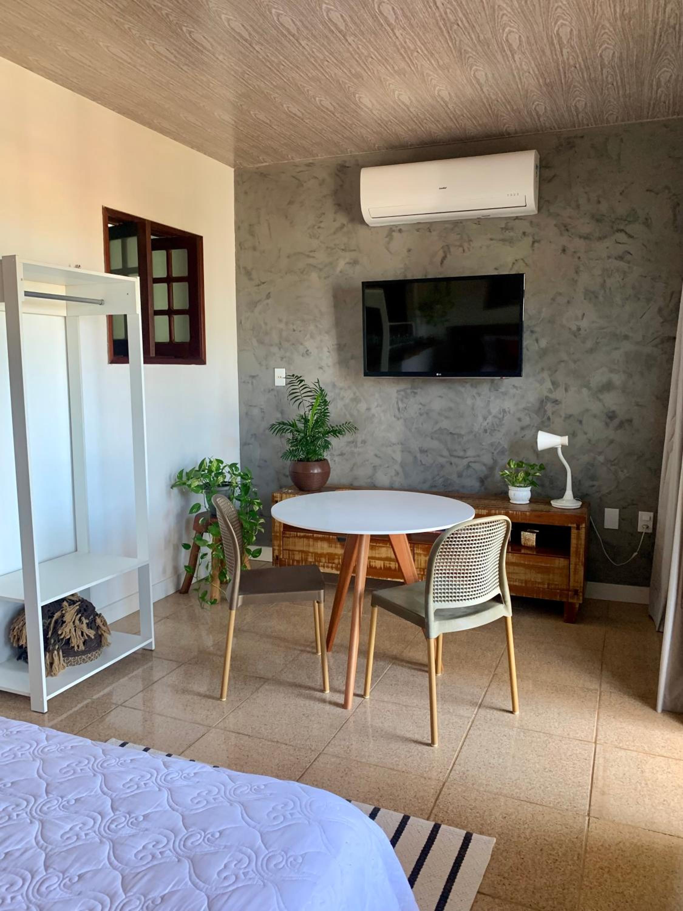 Suíte frente mar com cozinha e quintal pés na areia