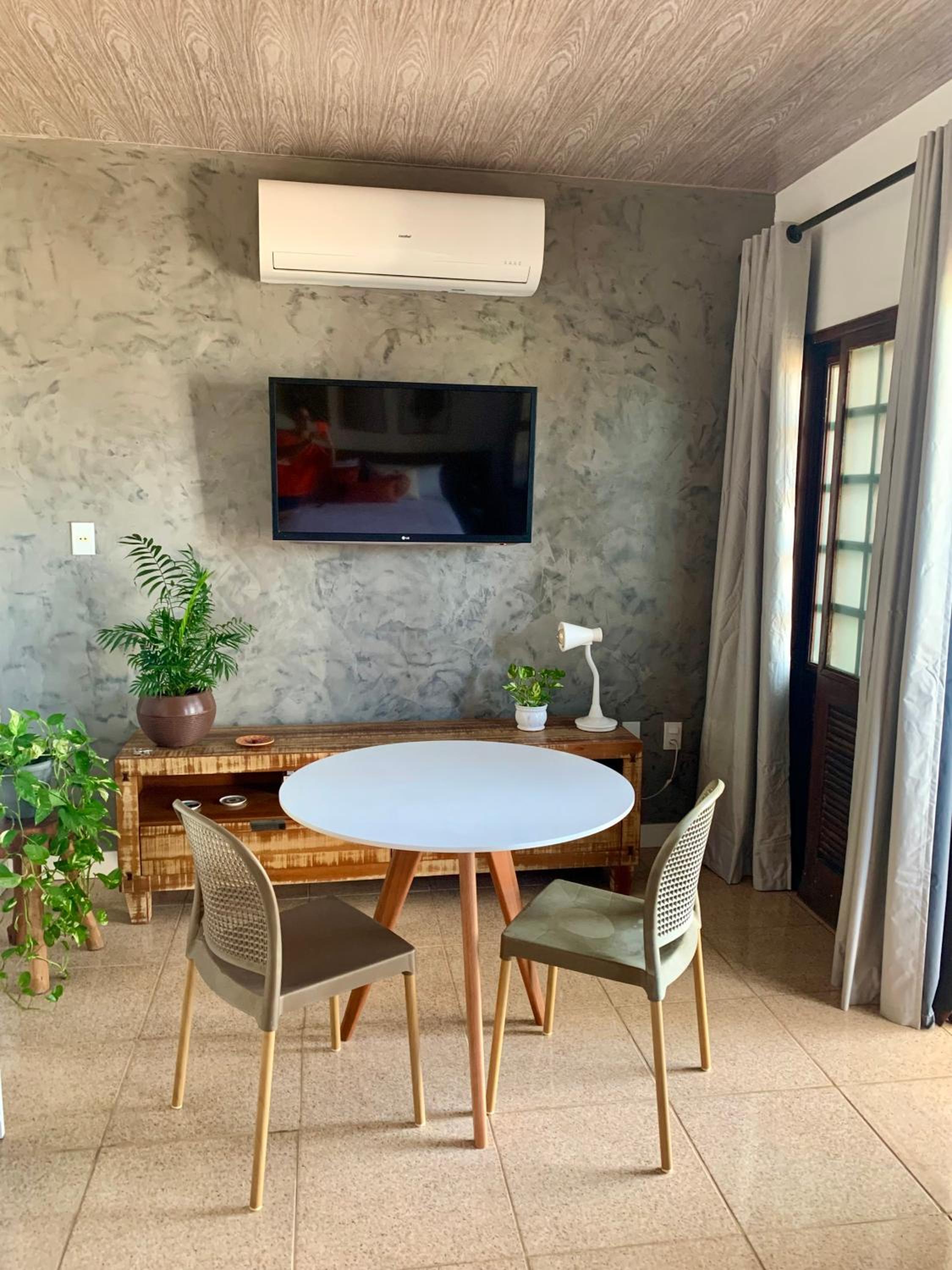 Suíte frente mar com cozinha e quintal pés na areia