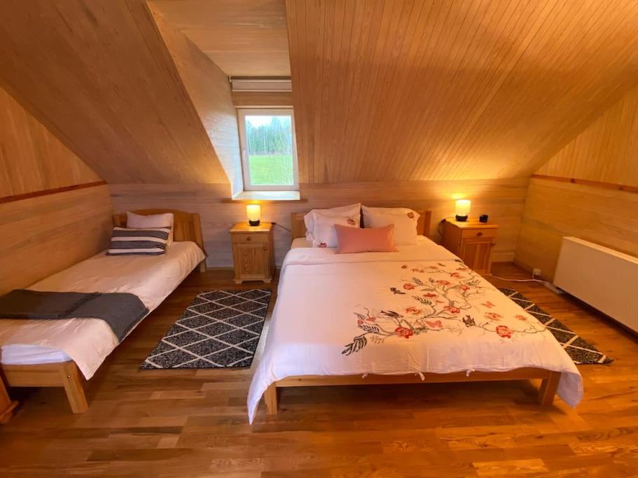 Luxury Waterfront Retreat with Panorama Room & Sauna at Sinso Talu