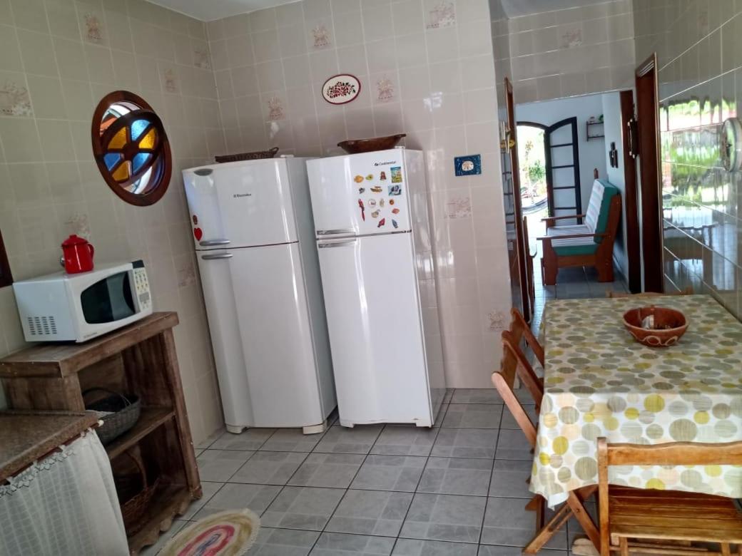 Linda casa com piscina à 3min da Praia caminhando