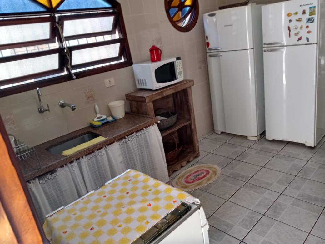 Linda casa com piscina à 3min da Praia caminhando