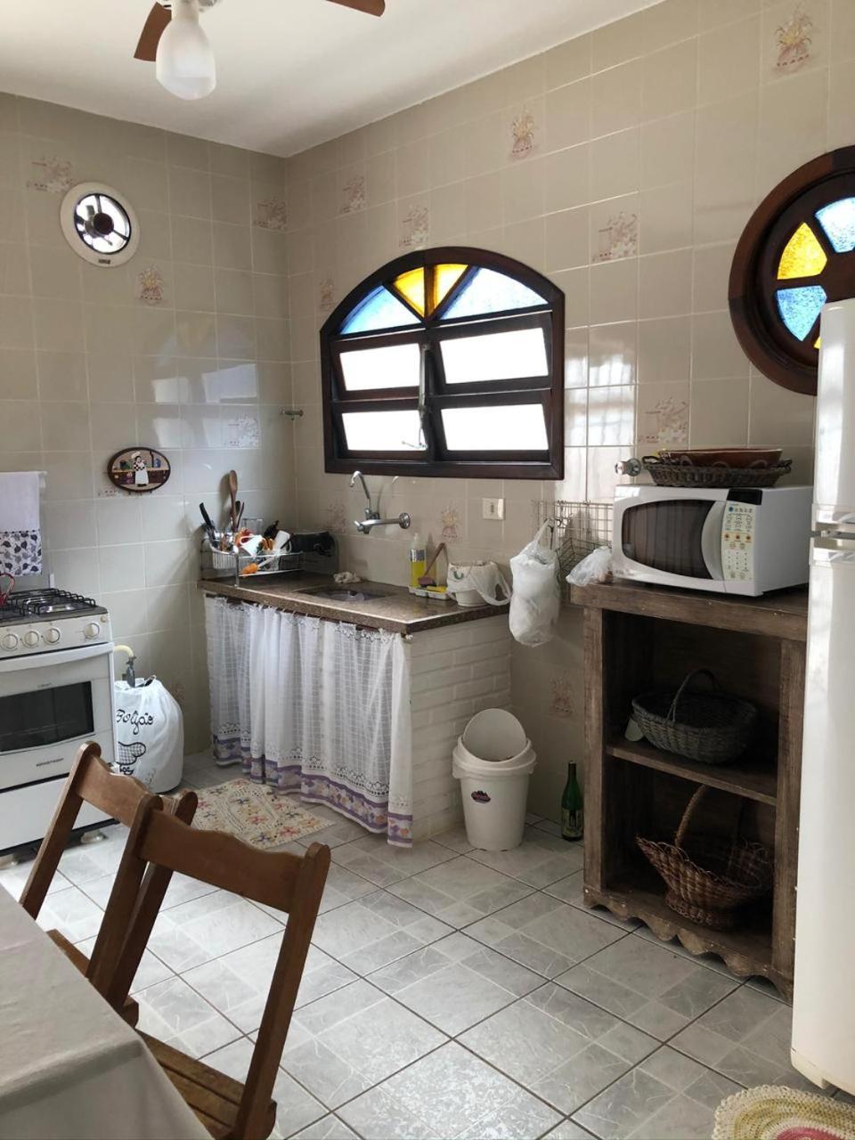 Linda casa com piscina à 3min da Praia caminhando