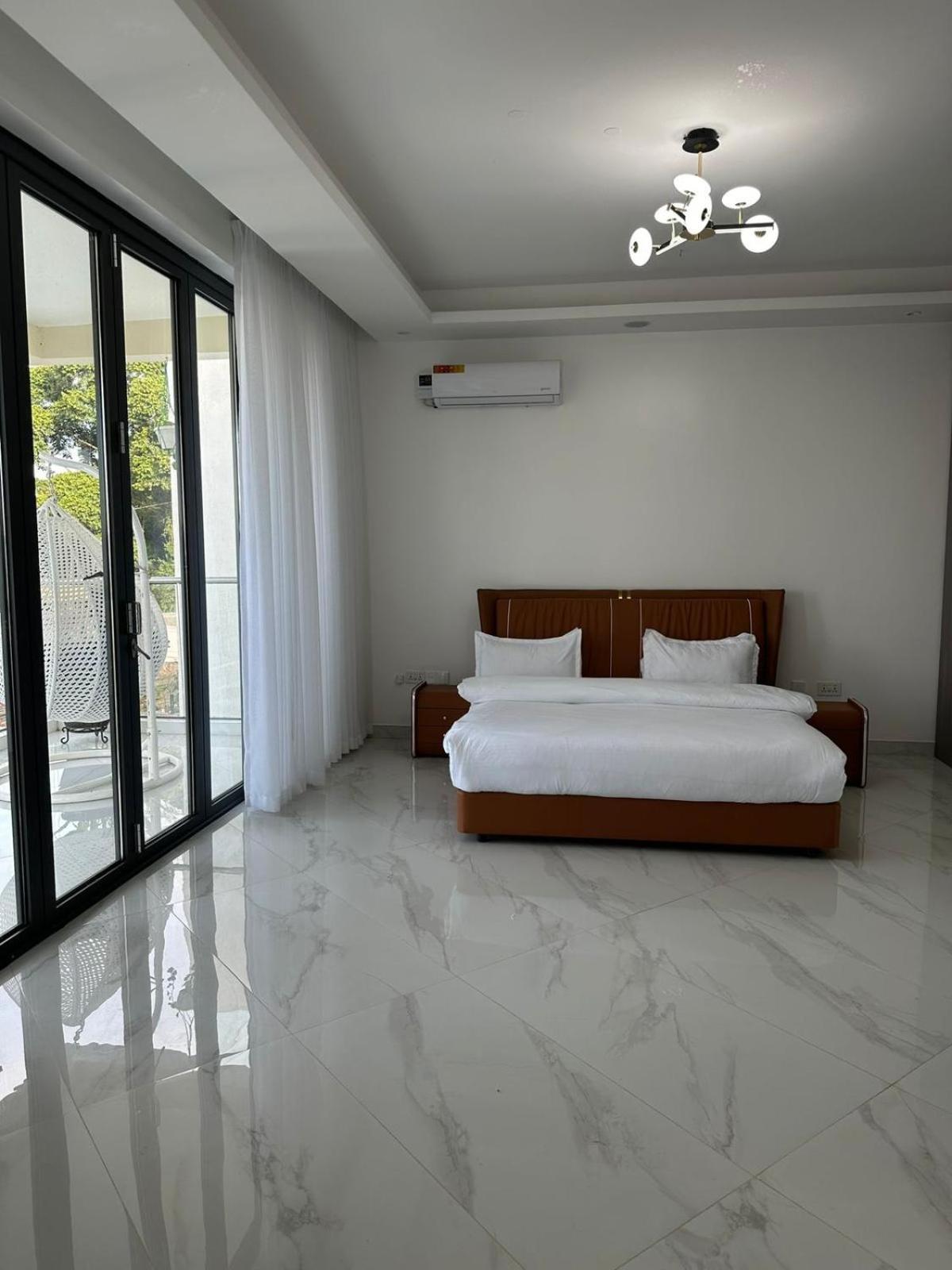 Infinity Pool Villas , Entebbe airport shuttle free parking private pool wifi 24 hr security