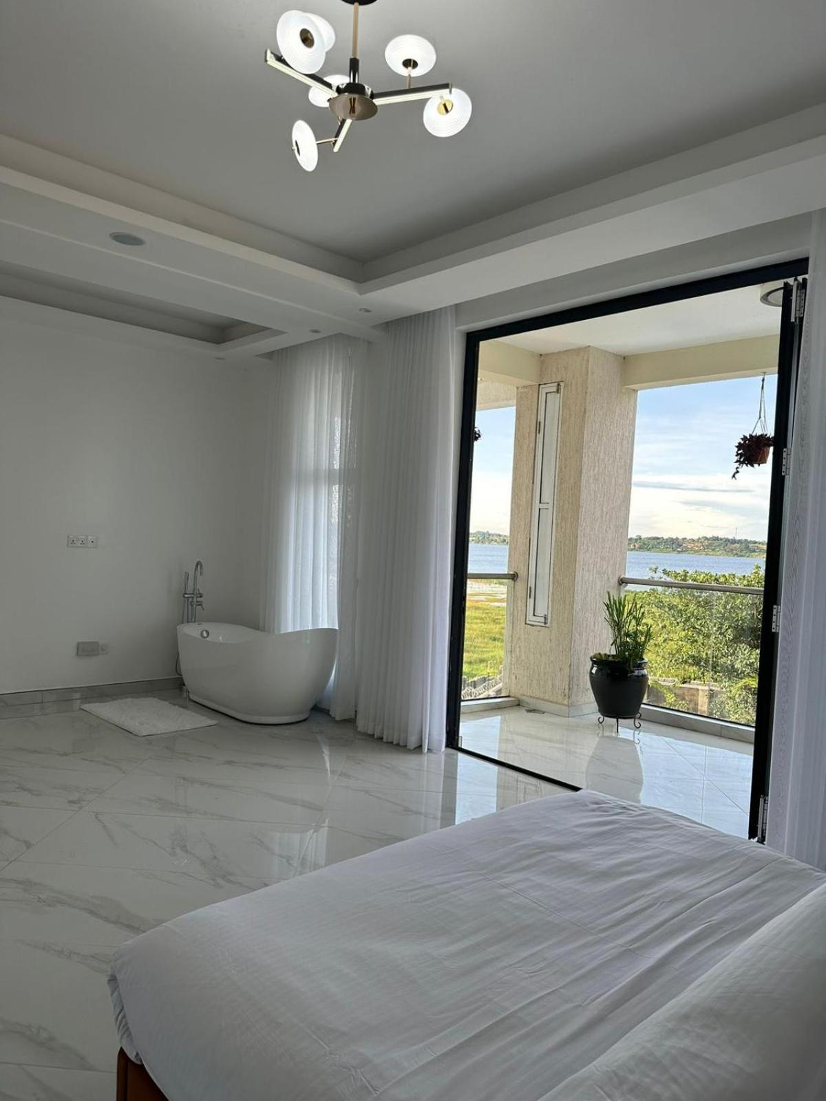 Infinity Pool Villas , Entebbe airport shuttle free parking private pool wifi 24 hr security