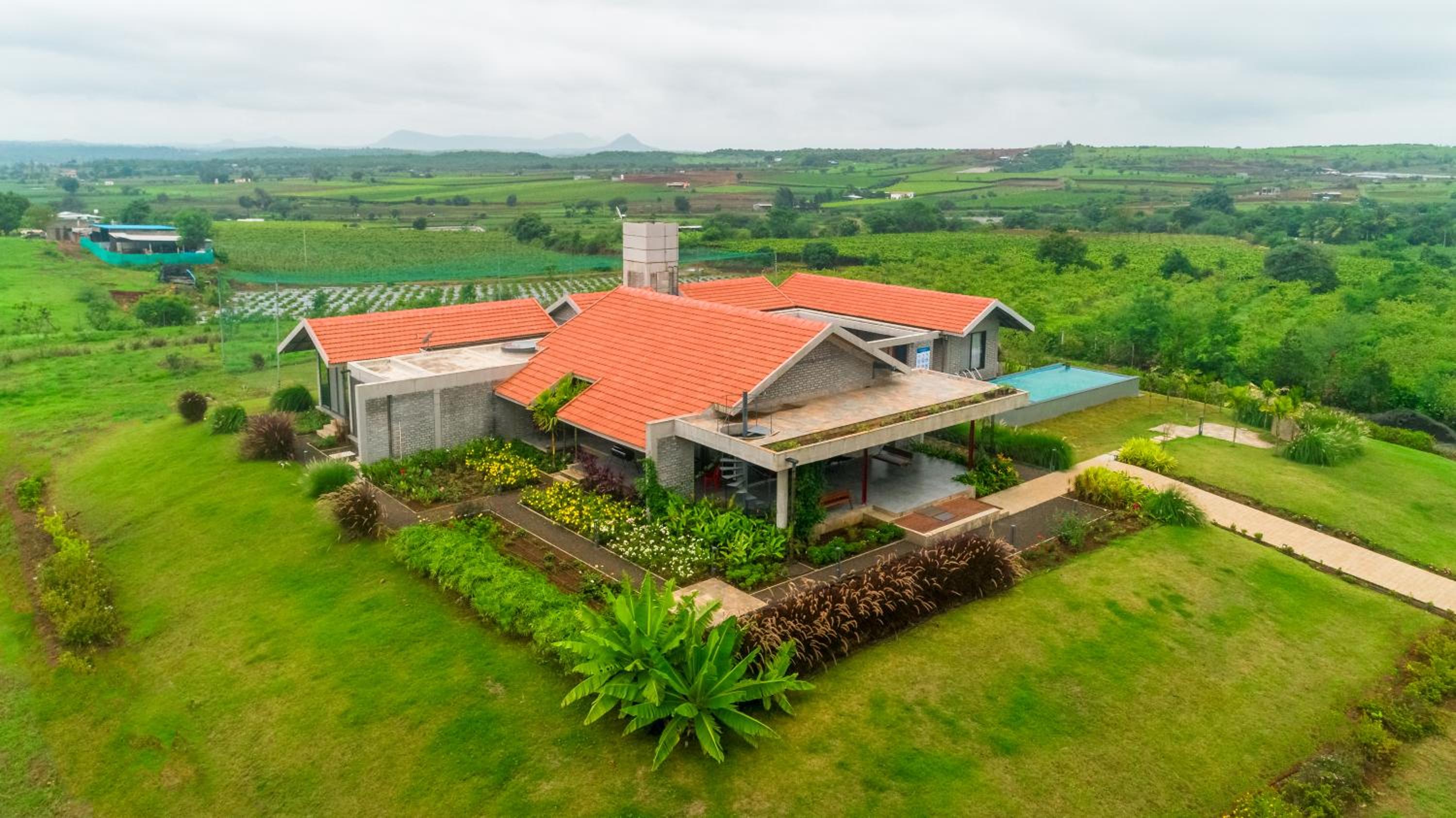 SaffronStays Ashfield - 5BHK Eco-Farmhouse with Pools, Jacuzzi, Lawn & Games Room view 3