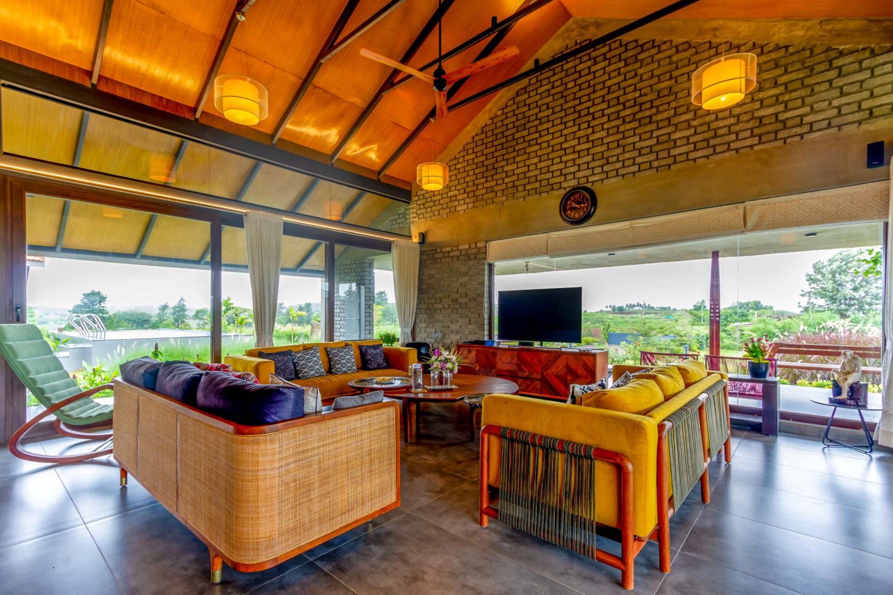 SaffronStays Ashfield - 5BHK Eco-Farmhouse with Pools, Jacuzzi, Lawn & Games Room view 4