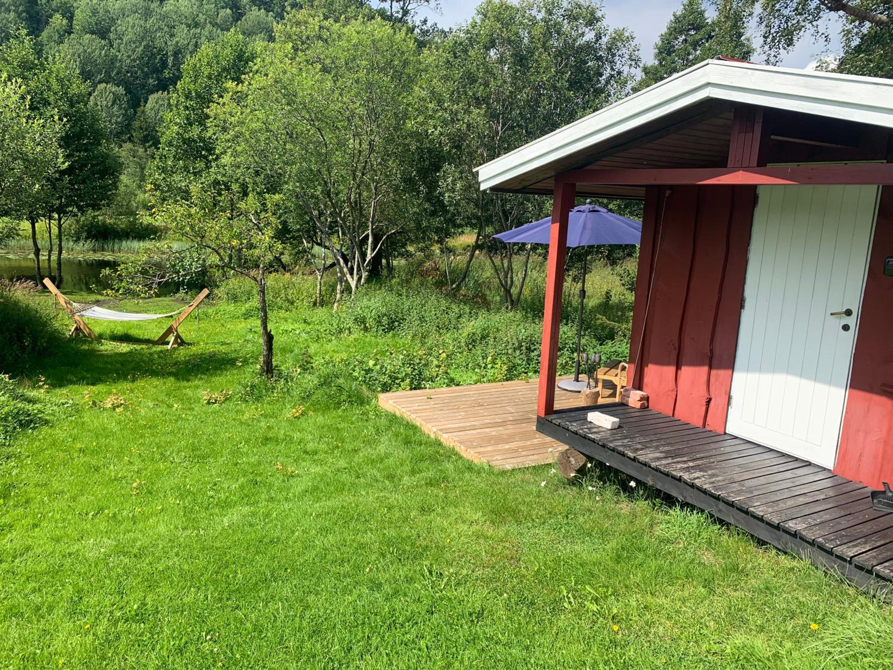 Riverside Bliss - Cozy Cabin near Tvedestrand with WiFi and Deck view 3