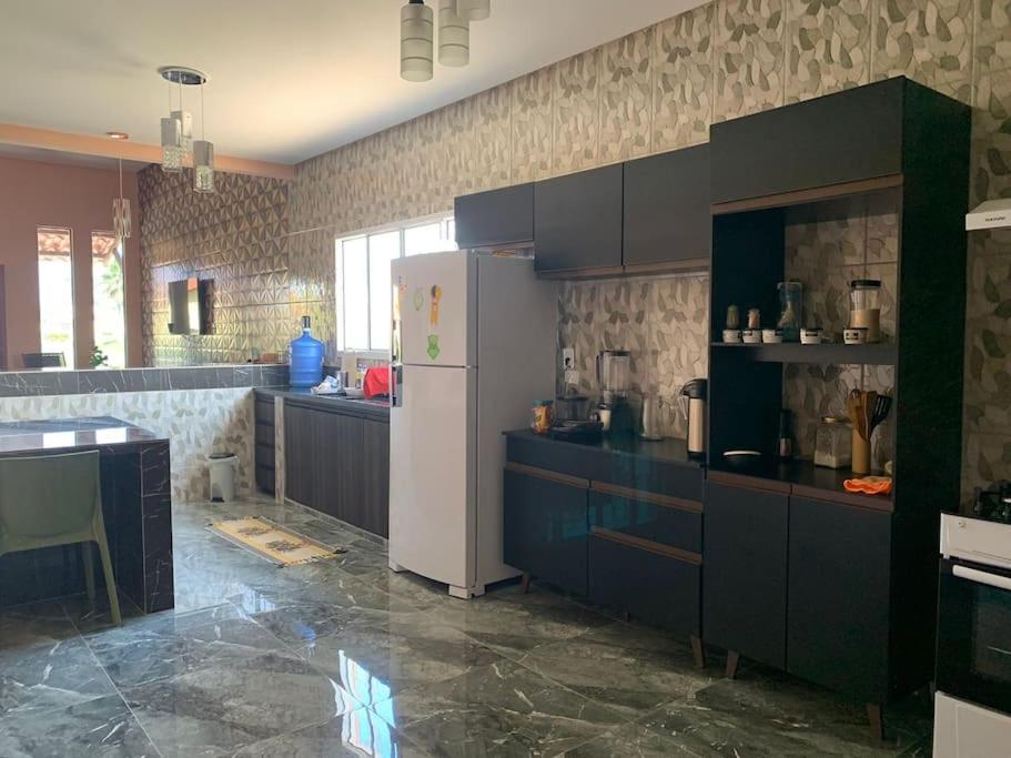 Casa no condomínio em Lucena Pb