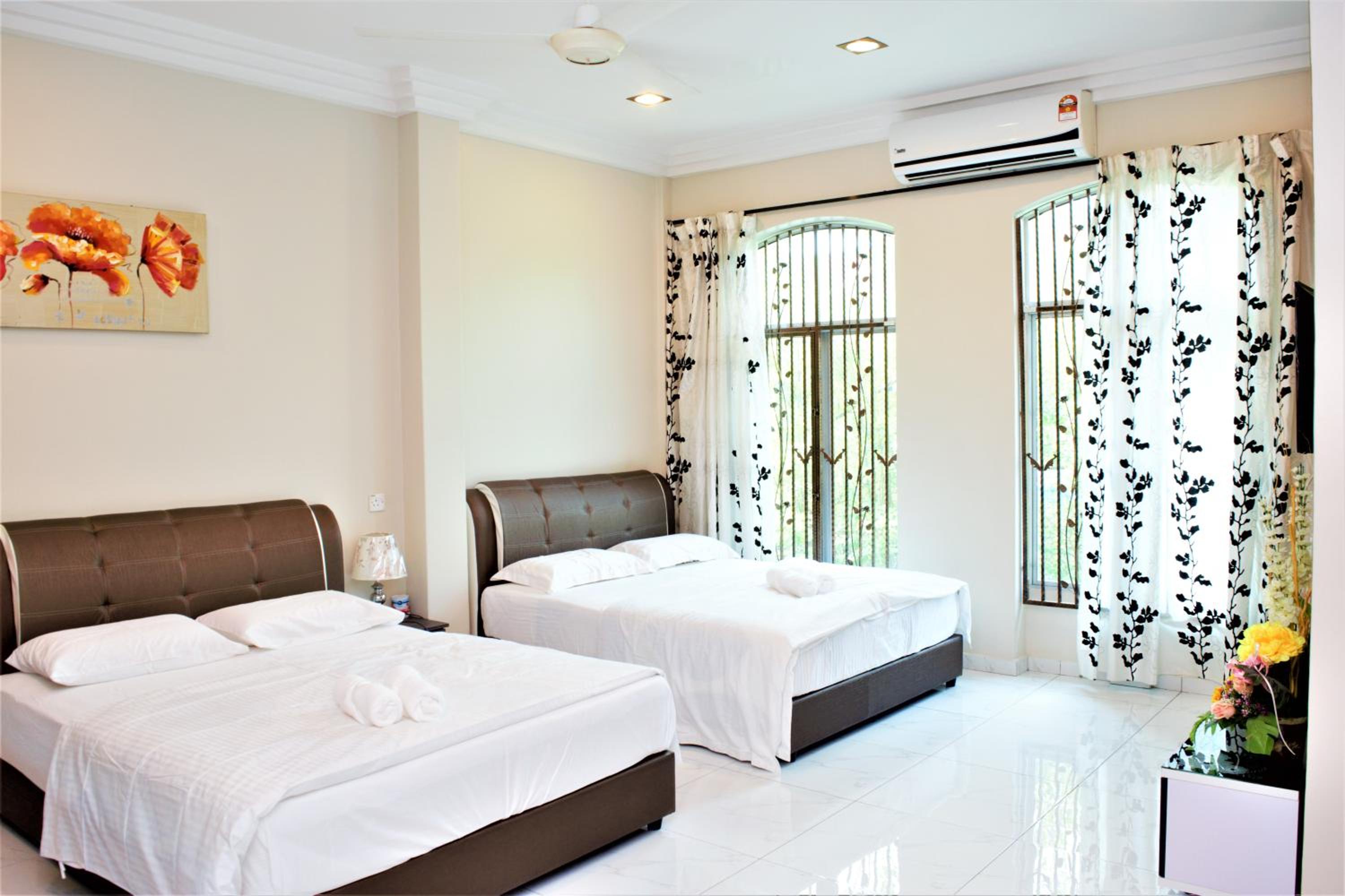 Charming Local Designer Home in Ipoh by Plush