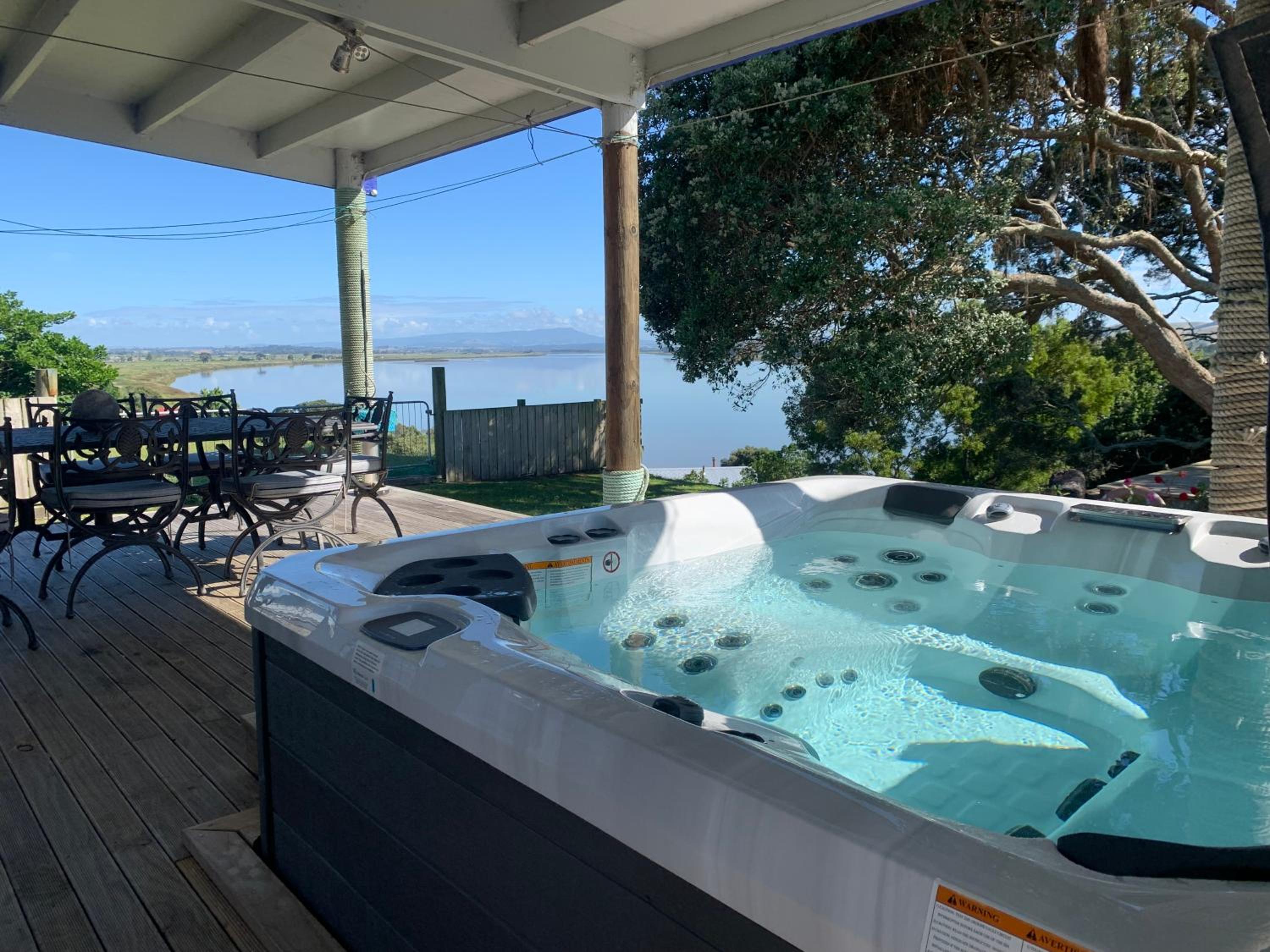 Large riverfront home with spa and stage view 2