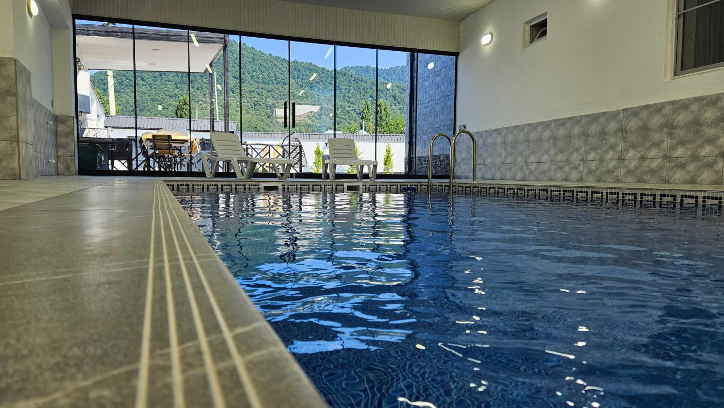 Luxury Milan Mountain Ponoramic Villa, indoor heated pool and jacuzzi with mountain view