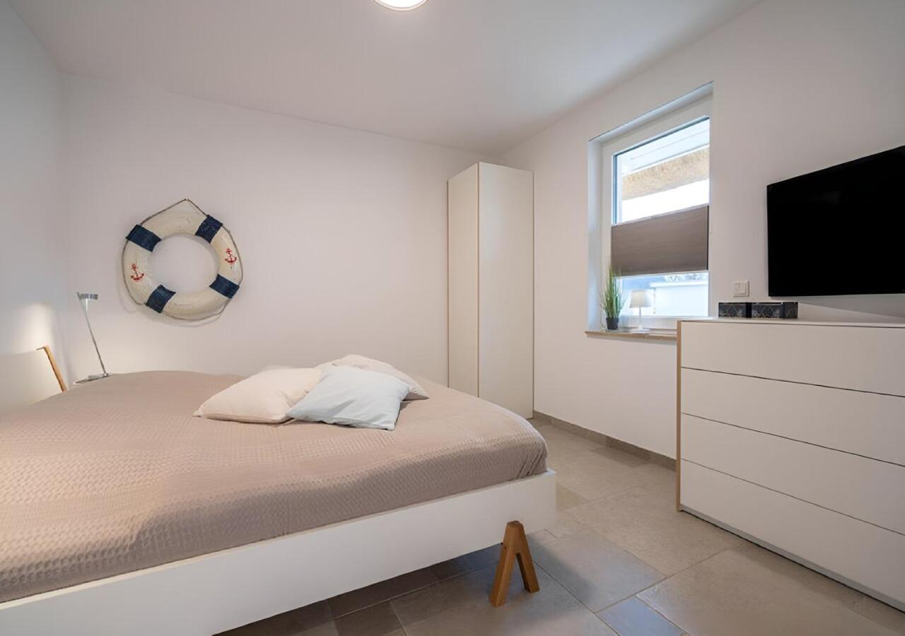 Seegras - Ferienhaus mit Kamin, Sauna und Meerblick