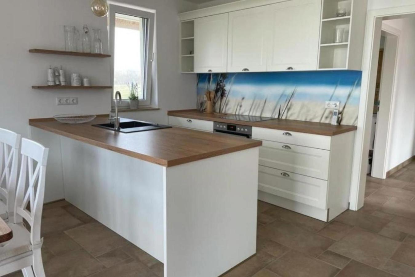 Wippezogel - Ferienhaus mit Sauna, Kamin und Meerblick