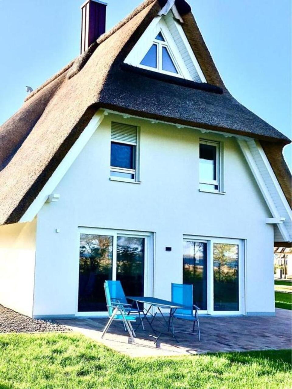 Villa Haffblick - Ferienhaus mit Kamin, Sauna und Meerblick