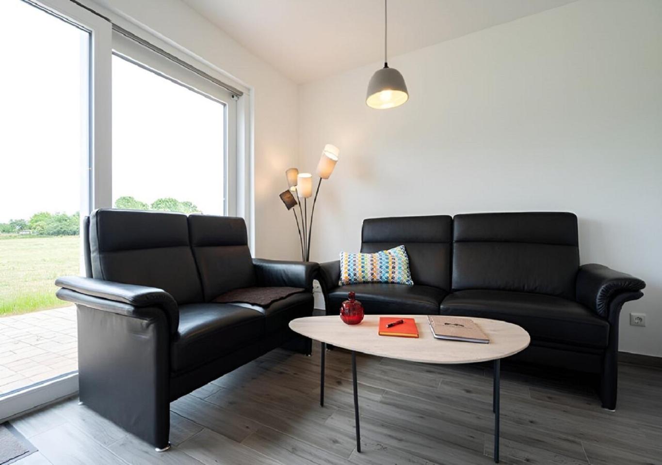 Villa Haffblick - Ferienhaus mit Kamin, Sauna und Meerblick