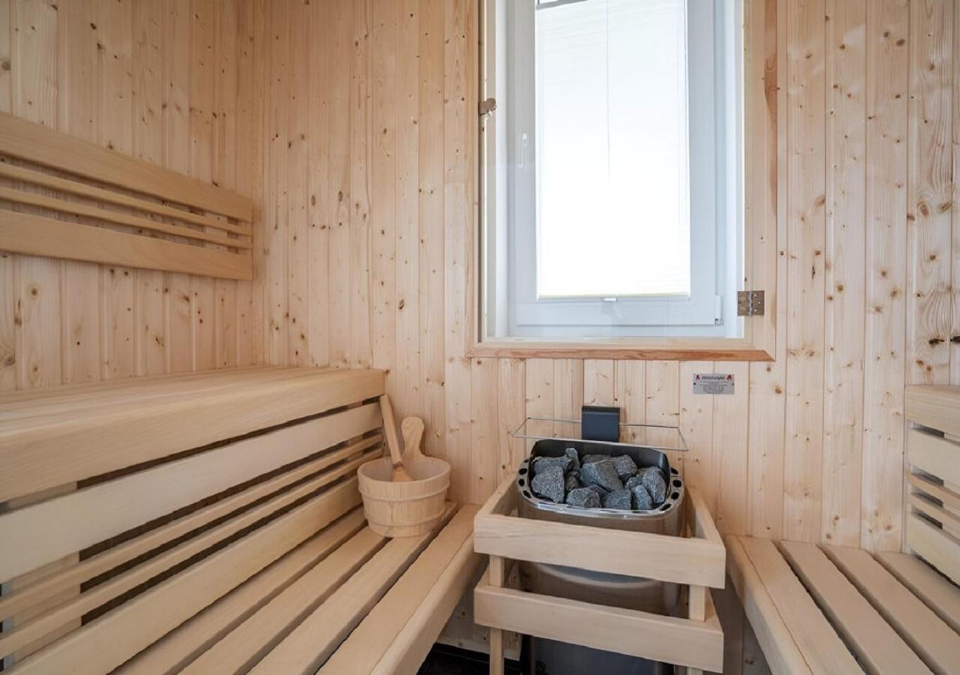 Villa Haffblick - Ferienhaus mit Kamin, Sauna und Meerblick