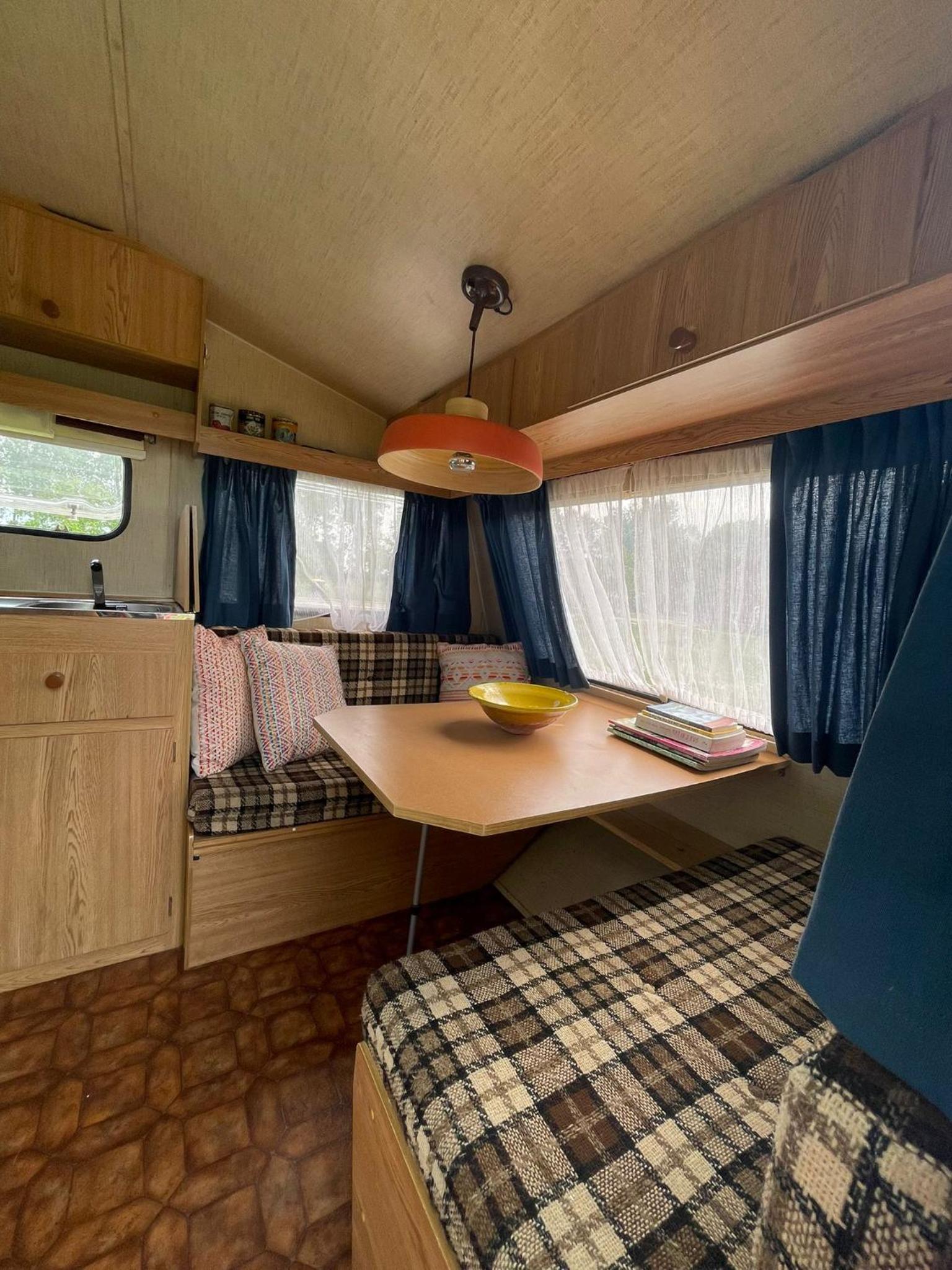 Vintage caravan in old orchard at farm Huize Blokland, photo 11