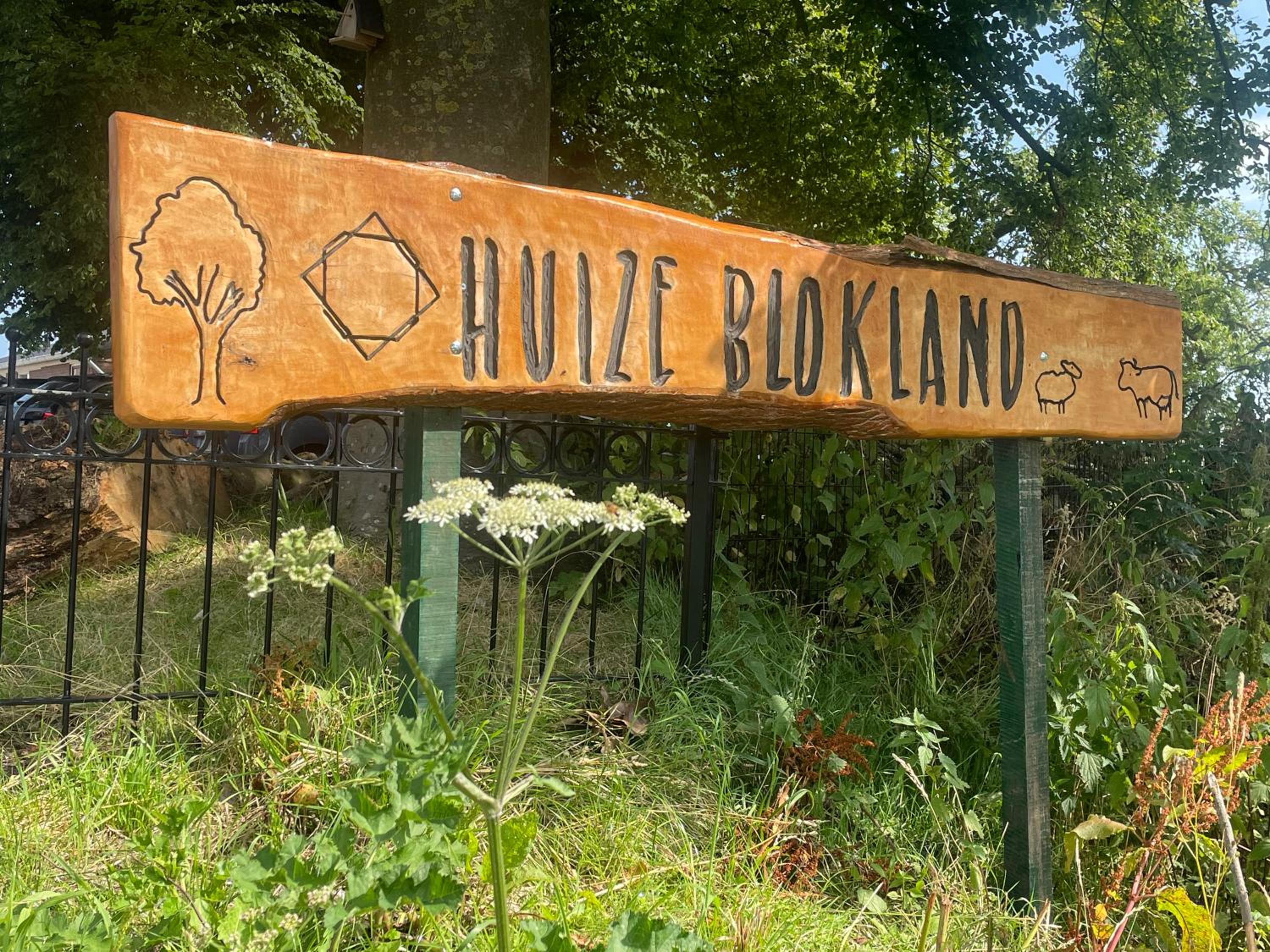 Vintage caravan in old orchard at farm Huize Blokland