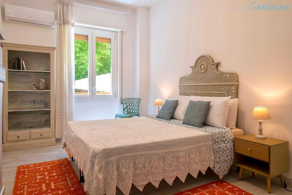 HiddenGarden apartment with garden and jacuzzi in the center of the city of Alghero