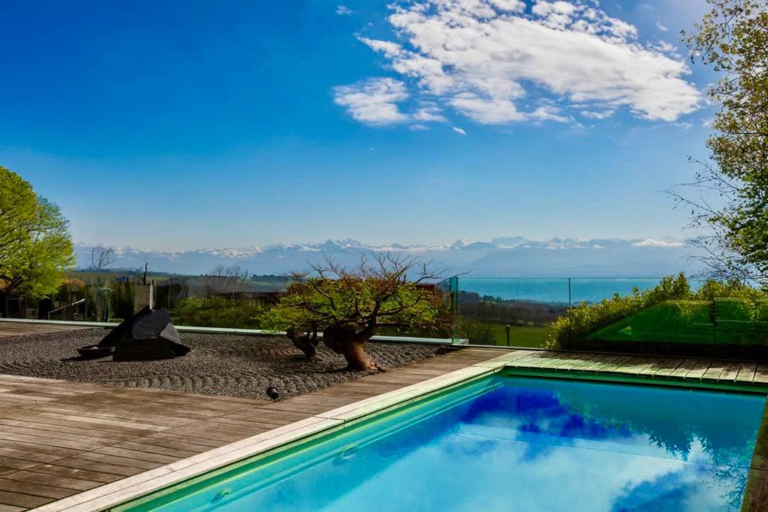 Exquisite 5-Bedroom Villa in Arzier for Families by GuestLee