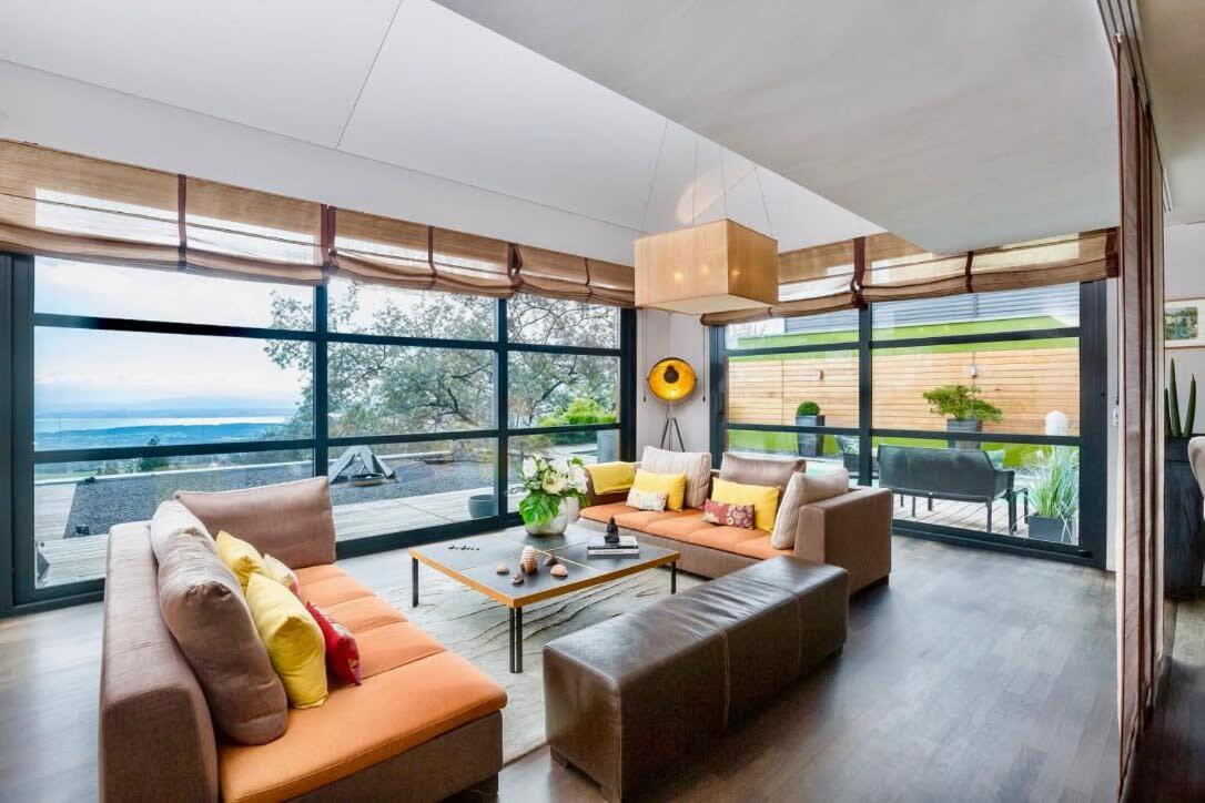 Exquisite 5-Bedroom Villa in Arzier for Families by GuestLee