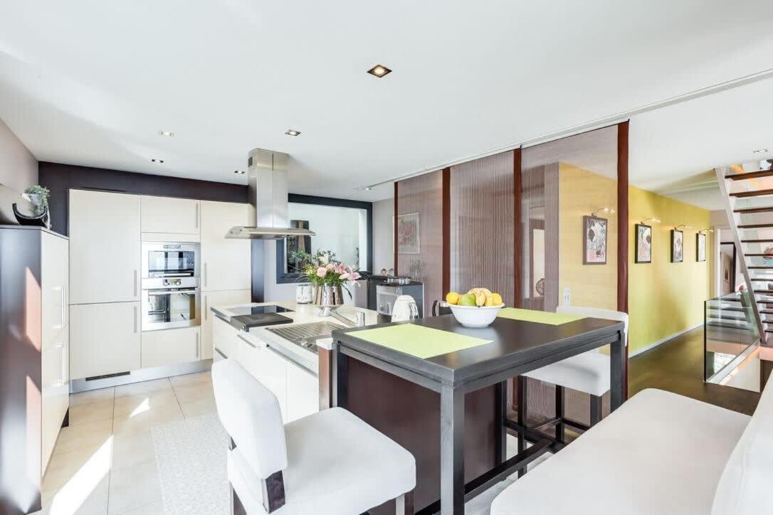 Exquisite 5-Bedroom Villa in Arzier for Families by GuestLee