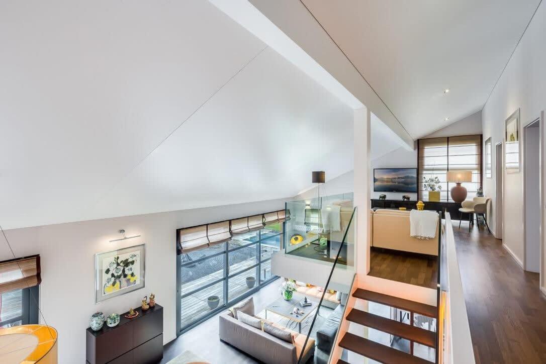 Exquisite 5-Bedroom Villa in Arzier for Families by GuestLee