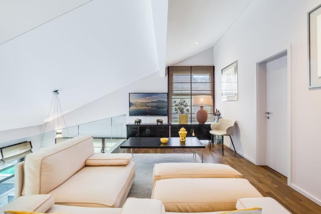 Exquisite 5-Bedroom Villa in Arzier for Families by GuestLee