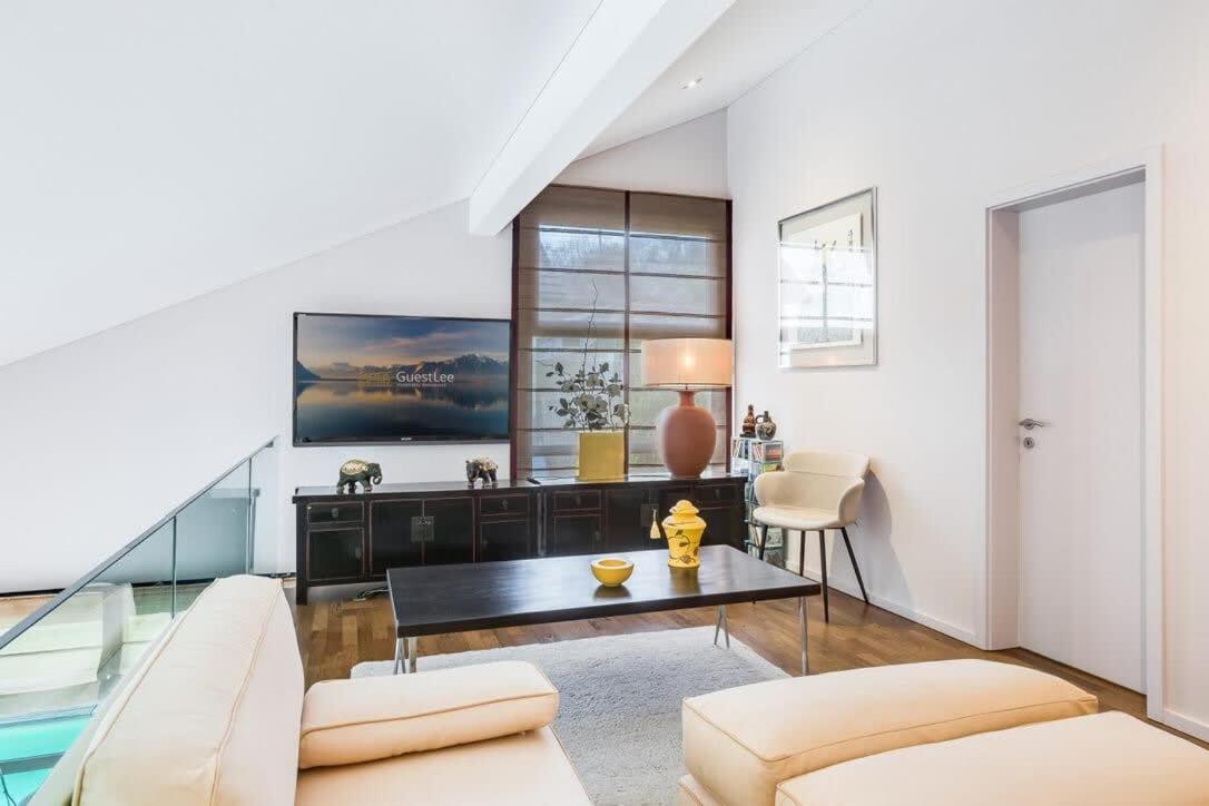 Exquisite 5-Bedroom Villa in Arzier for Families by GuestLee
