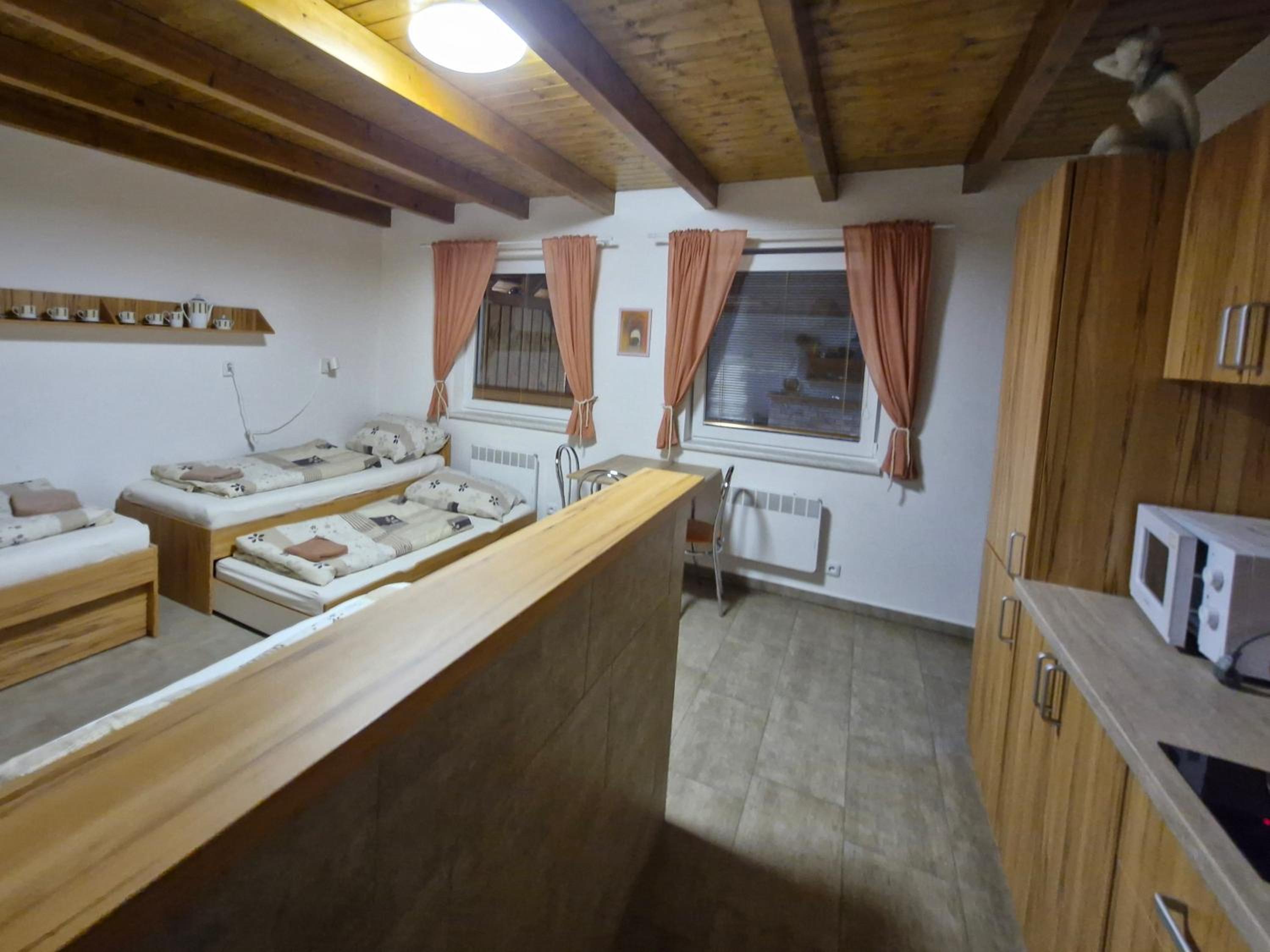 Apartmány pod pergolou