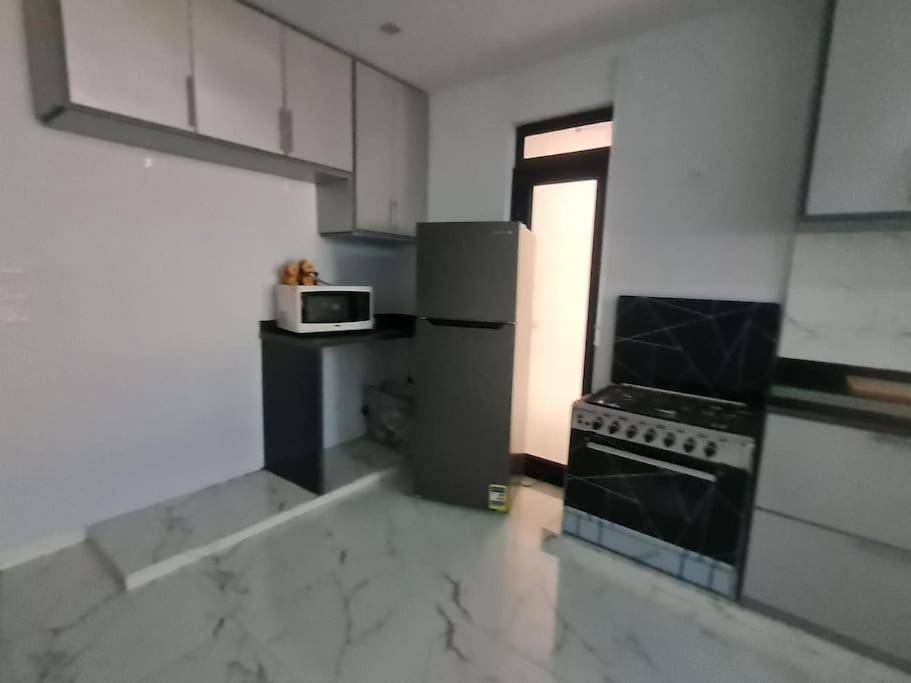 Stunning City Stay in 3 bedroom in Midtown Compound Auc Avenue