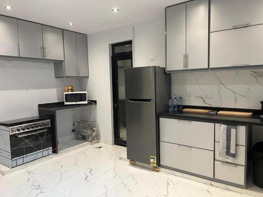 Stunning City Stay in 3 bedroom in Midtown Compound Auc Avenue