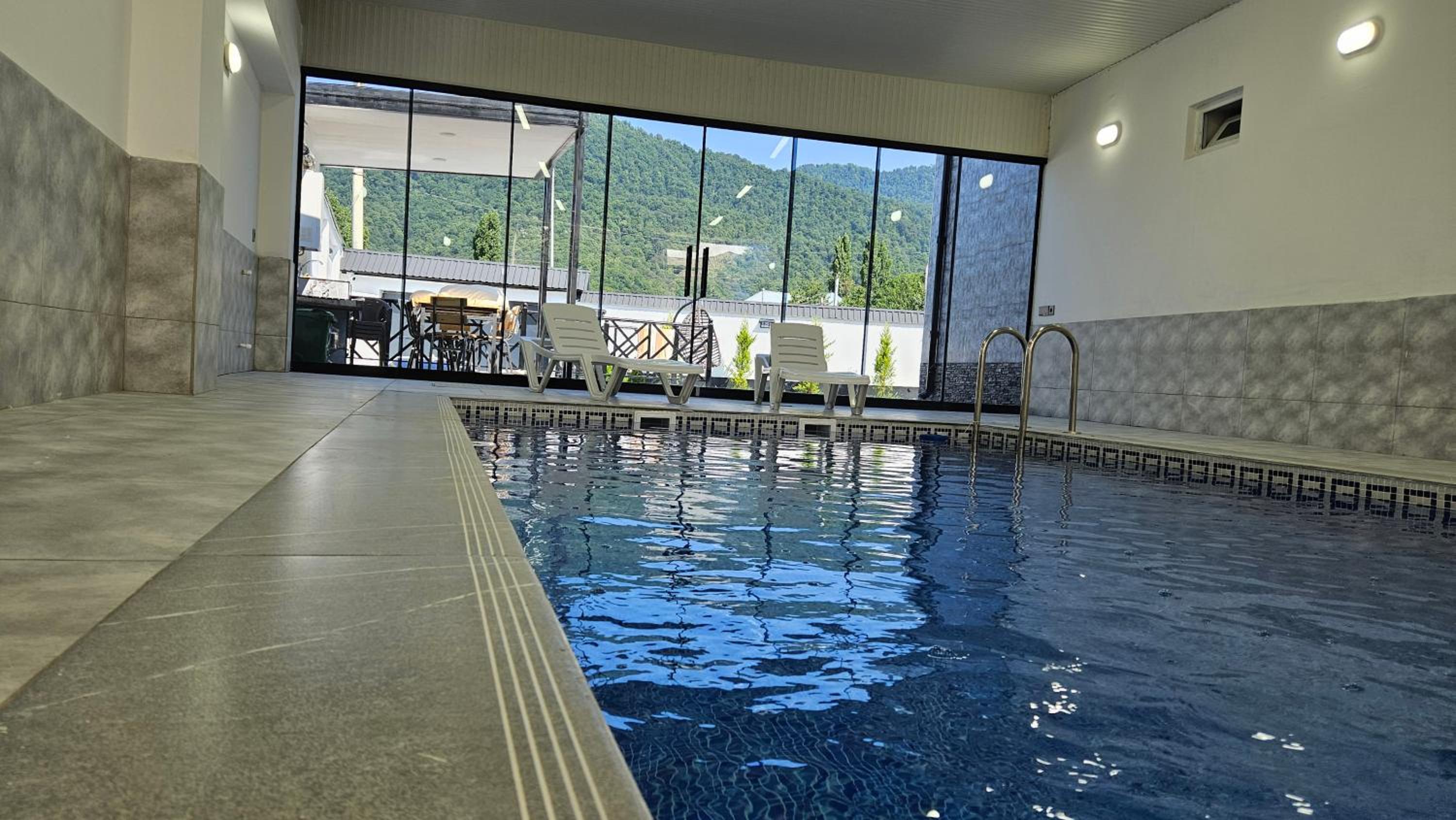 Luxury Milan Mountain Ponoramic Villa, indoor heated pool and jacuzzi with mountain view