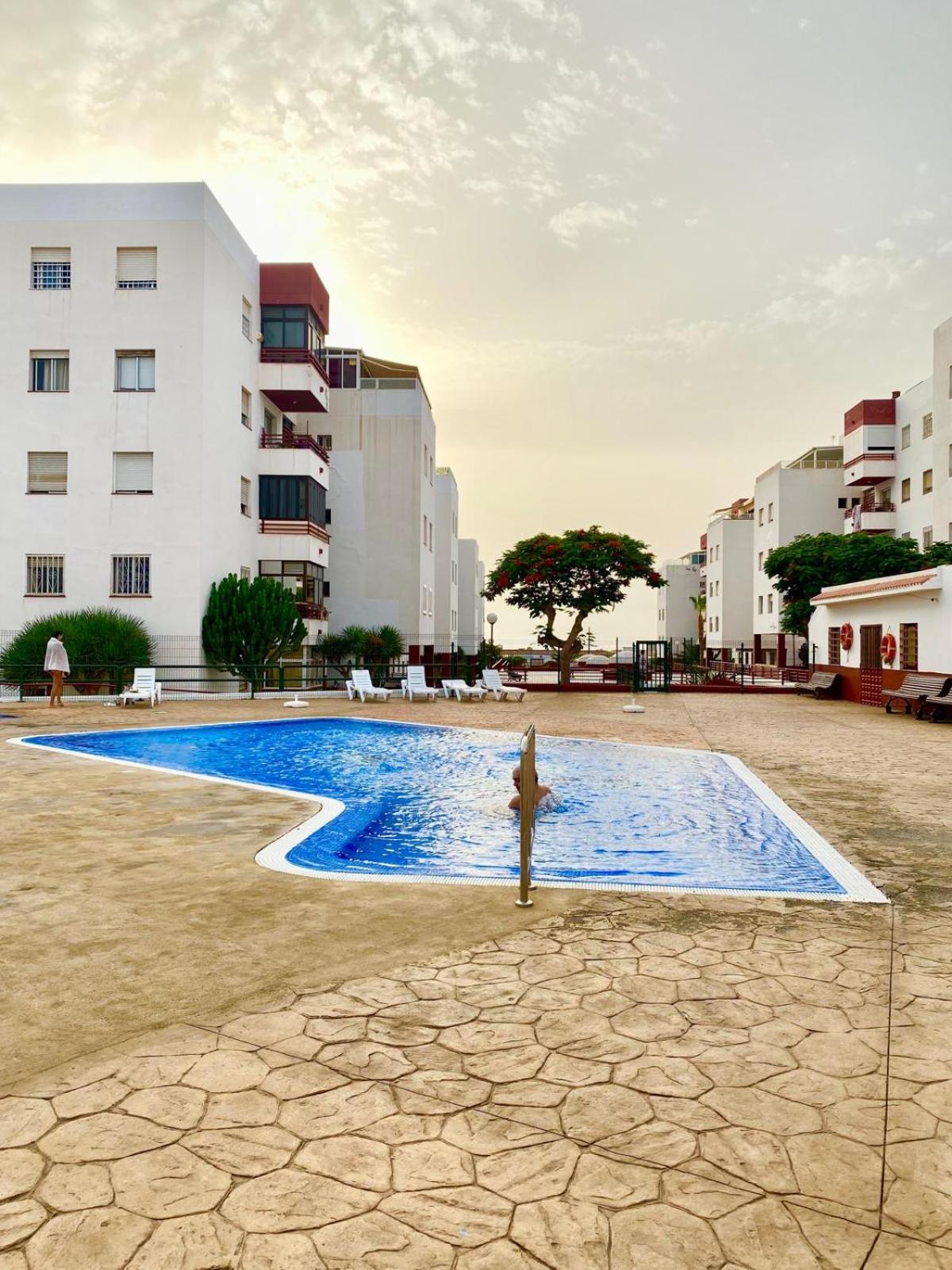 Spacious 3-Bedroom Apartment with Pool & Balcony - Steps from Puerto Colón, Beach & All Local Attractions