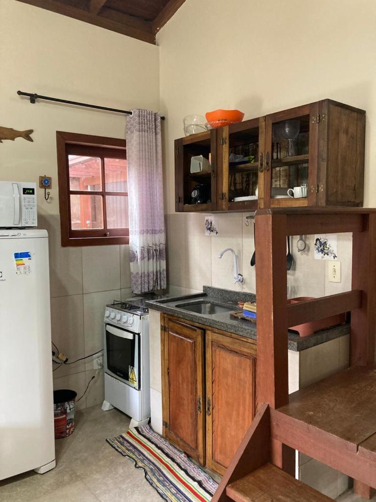 Residencial Casa Laranja - Casas na Praia da Ferrugem