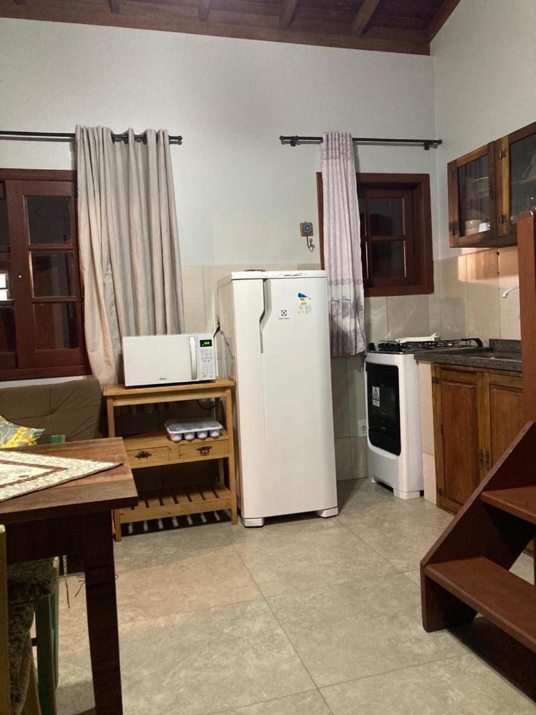 Residencial Casa Laranja - Casas na Praia da Ferrugem