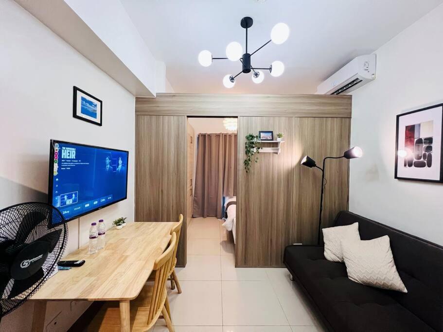 1BR Condotel with Balcony at FAME Residences #FM19 view 2
